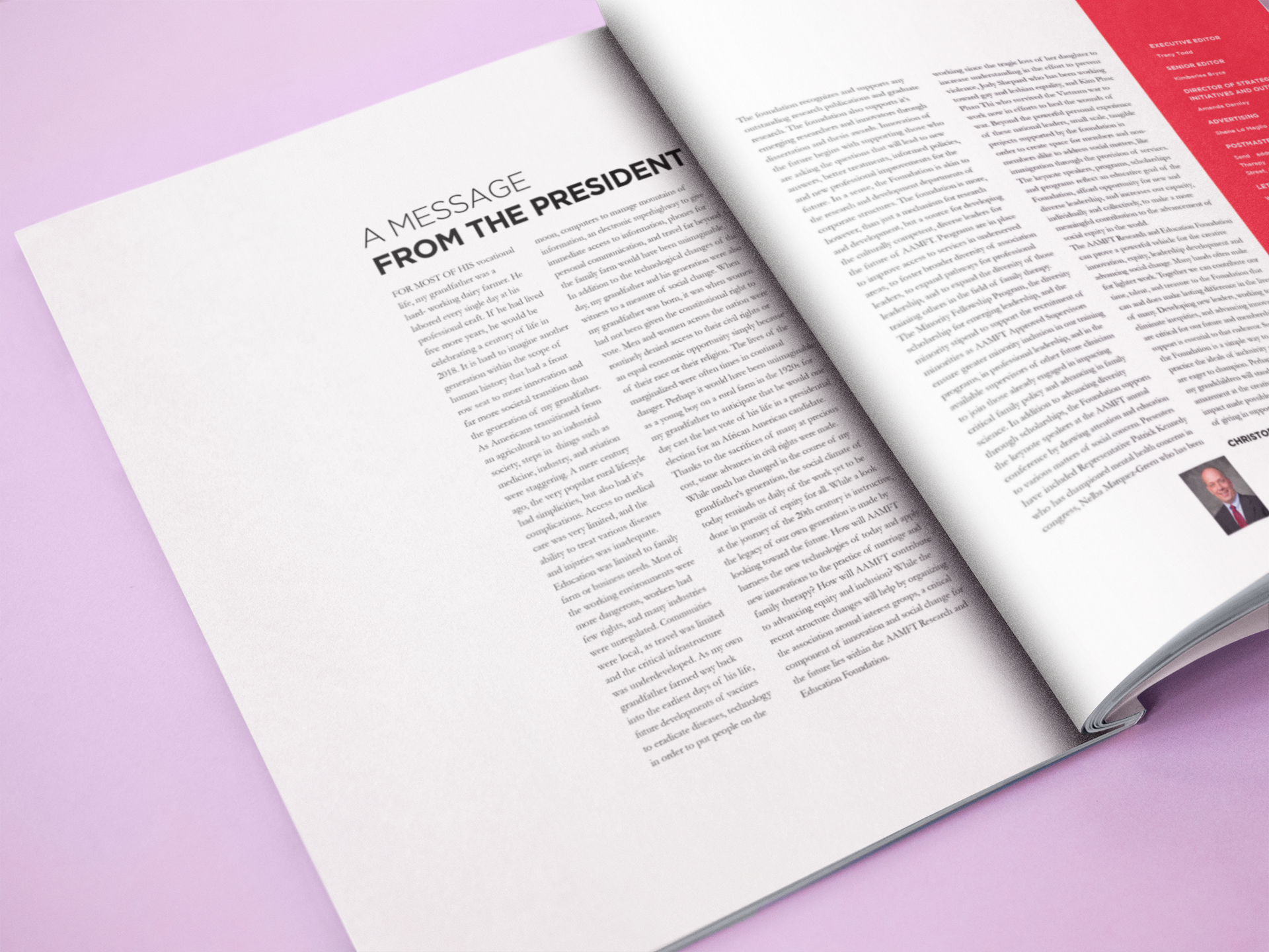 open-magazine-lying-on-a-pink-surface-template-a14485.png
